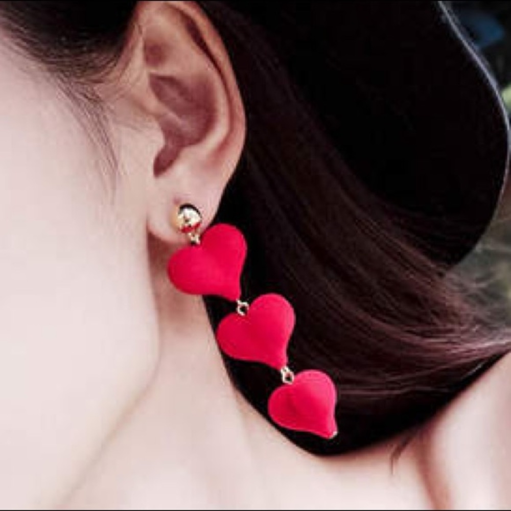 Dangling red heart earrings
